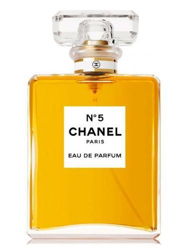 Slightly angled Chanel No 5 Eau de Parfum bottle with crystal-like cap and amber juice