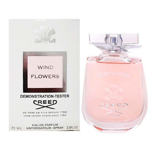 Creed Wind Flowers fragrance with outer packaging, showing soft pink flacon and silver cap in presentation box
