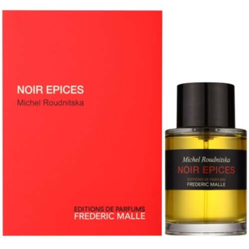 Noir Epices by Frédéric Malle presented with vivid red box and standing fragrance bottle