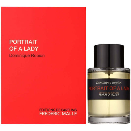 Portrait of a Lady by Frédéric Malle showcased alongside signature red box and labeled tester flacon