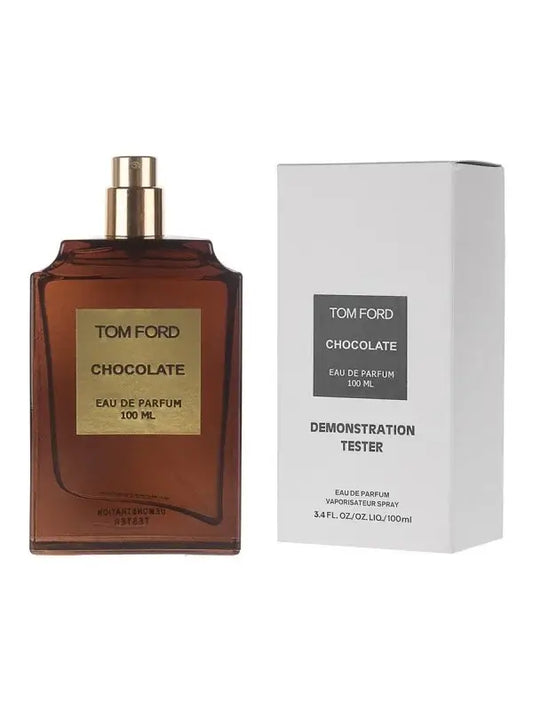 Chocolate by Tom Ford presented next to minimalist white box, warm-toned flacon in upright view