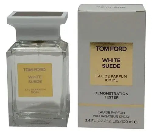 Tom Ford White Suede tester bottle beside branded box with gold front panel and white sides