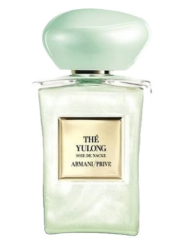 Pearlescent green bottle of Armani Prive The Yulong Soie de Nacre 100ml with matching pastel green cap and gold label