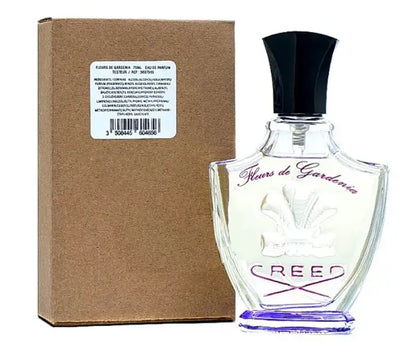 Creed Fleurs De Gardenia tester bottle with black cap next to plain brown packaging and barcode sticker