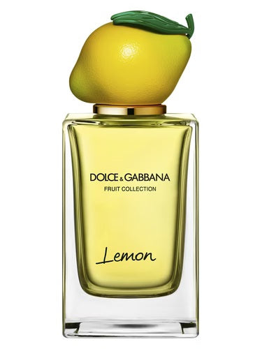 Dolce & Gabbana Lemon Fruit Collection 150ml bottle with vibrant yellow liquid and sculpted lemon cap, symbolizing citrus freshness and playful design.