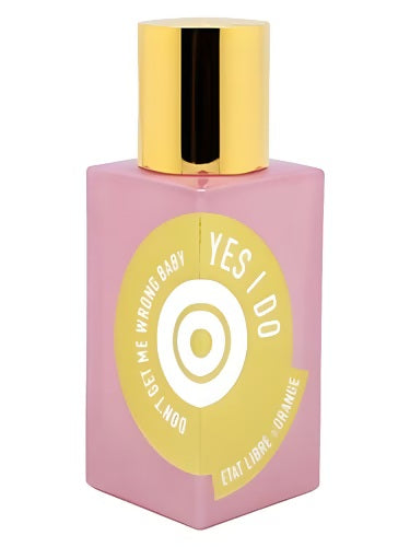 Pink bottle of Etat Libre d’Orange Yes I Do Don’t Get Me Wrong Baby EDP 100ml with gold cap and circular yellow label design