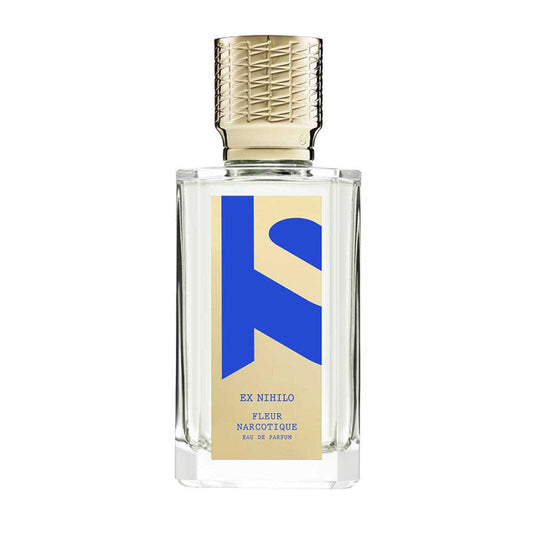 Photograph of Ex Nihilo Fleur Narcotique 10 Years Edition EDP 100ml bottle with bold blue abstract logo and gold label, featuring luxury anniversary design