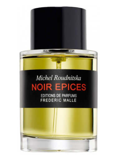 Frédéric Malle Noir Epices tester in sleek glass bottle with dark cap and golden amber liquid