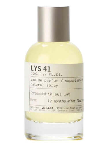 Le Labo Lys 41 tester bottle with silver cap and light yellow fragrance, white background