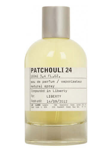 Le Labo Patchouli 24 tester bottle with silver cylindrical cap on white background
