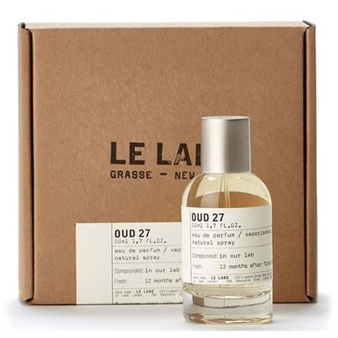 Le Labo Oud 27 tester displayed with kraft box and front-facing bottle