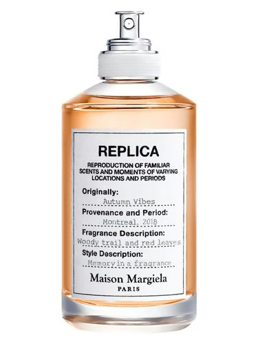 Maison Margiela Replica Autumn Vibes EDT 100ml bottle with label showing woody trail and red leaves fragrance
